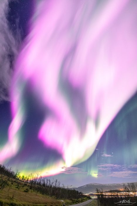 Solar Storm Creates Rare Pink Aurora